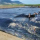 Encapsulamiento de reservorio con geomembrana HDPE total